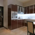 Brown Kitchen Cabinets Installation – Warmth Meets Functionality